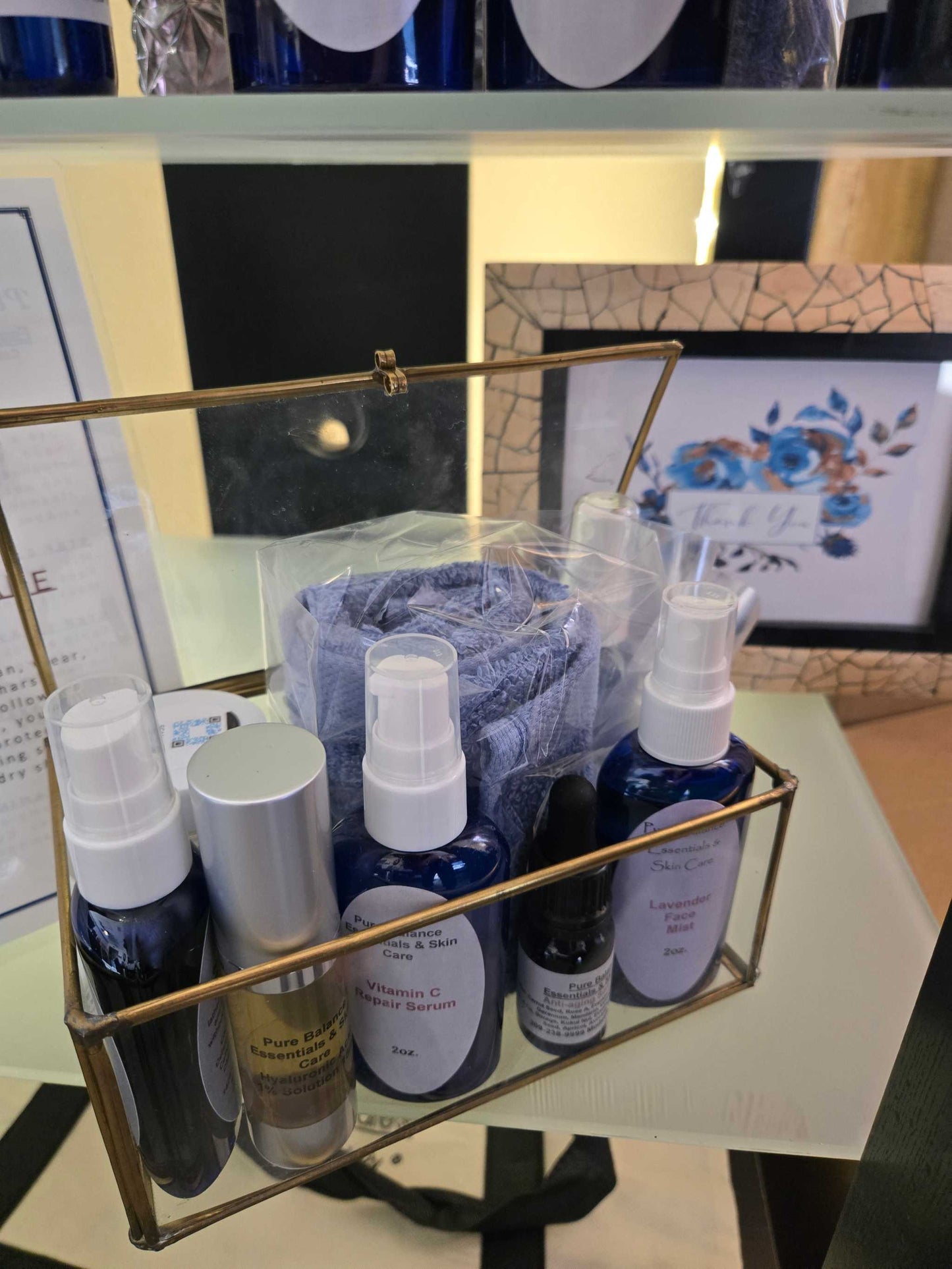 100% Cotton Ring Spun Wash Cloth in skincare kit, colors vary between grey, blue, and nautical night blue.