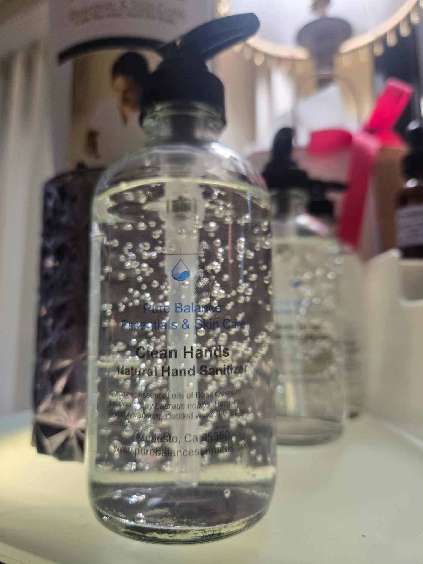Clean Hands Hand Sanitizer 8 ounces in a glass pump bottle.