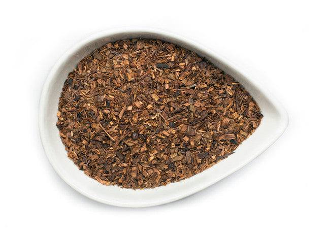 Organic Honeybush Tea blend with red rooibos in a steaming cup