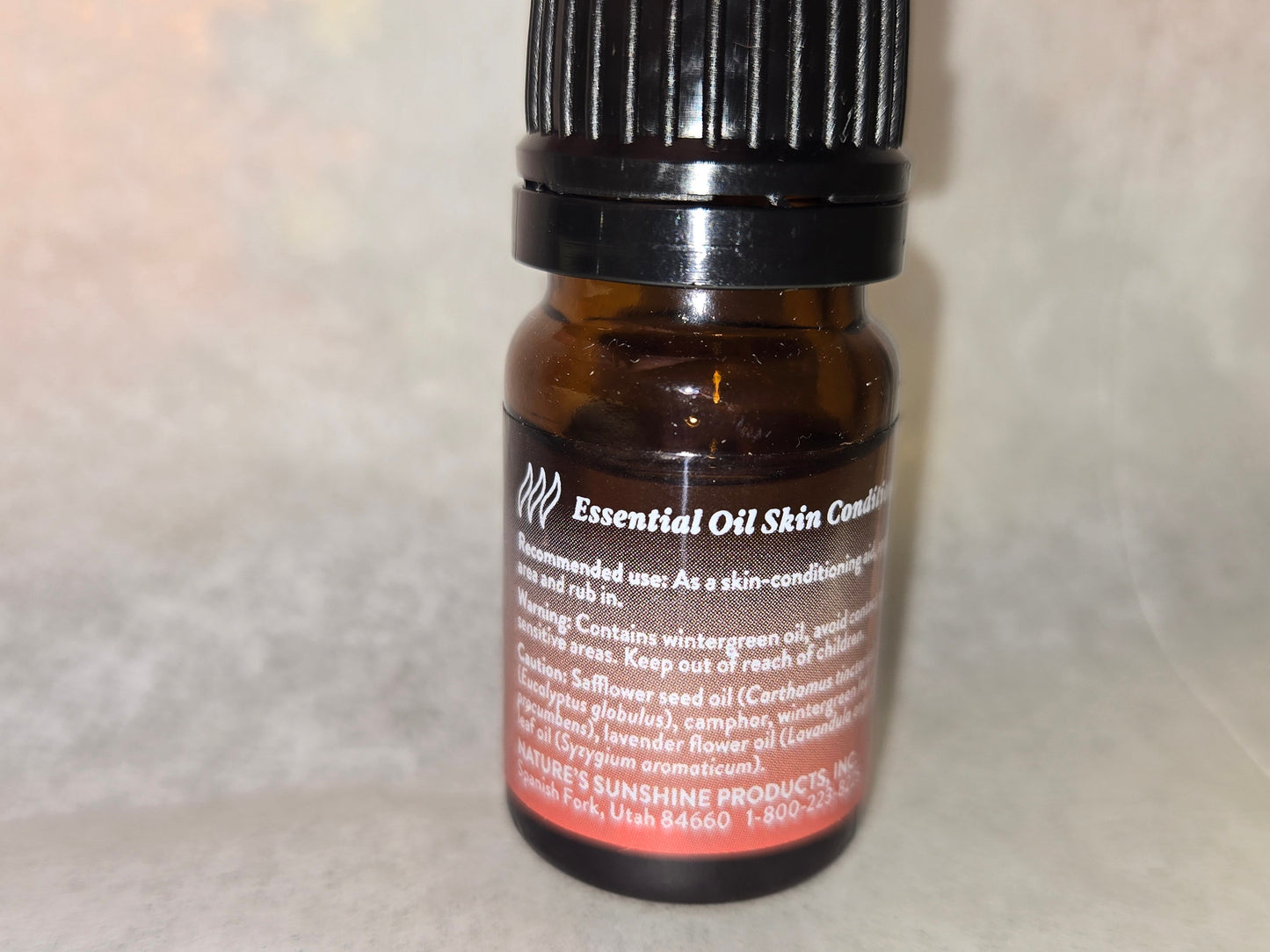 TEI-FU Essential Oil Blend in amber bottle for invigorating and refreshing use.