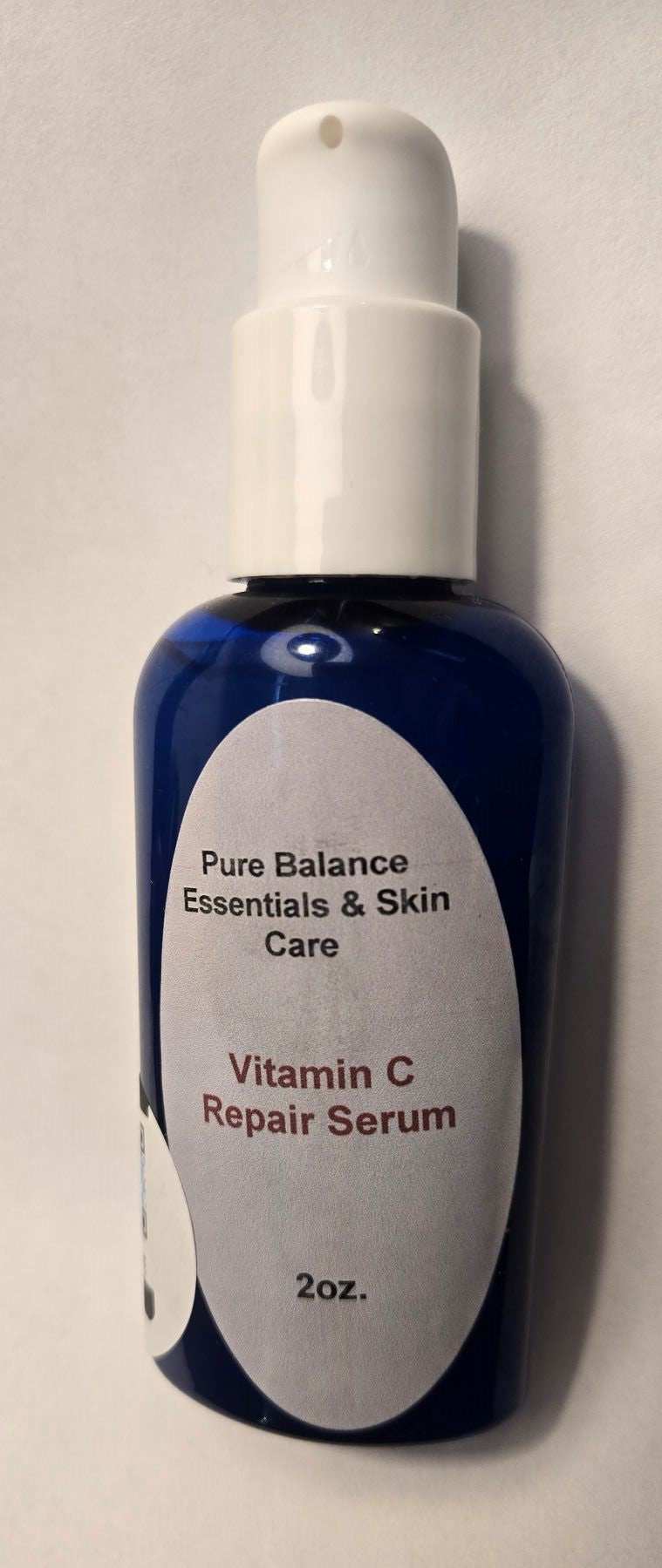 Blue bottle of Vitamin C Serum, 2oz, by Pure Balance Essentials
