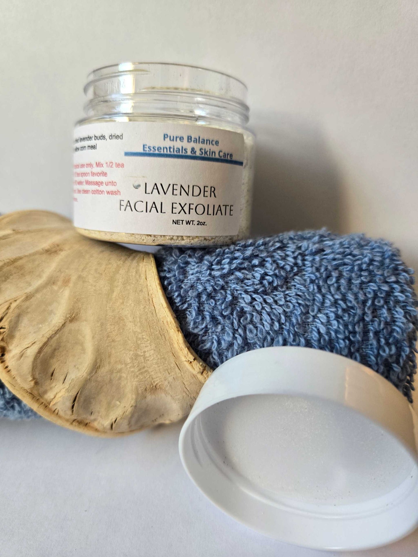 2oz jar of Lavender Facial Exfoliant for natural skin conditioning with lavender buds, milk, and cornmeal