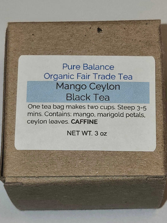 Organic Mango Ceylon Tea blend with black tea leaves, mango pieces, and calendula petals in a vibrant package