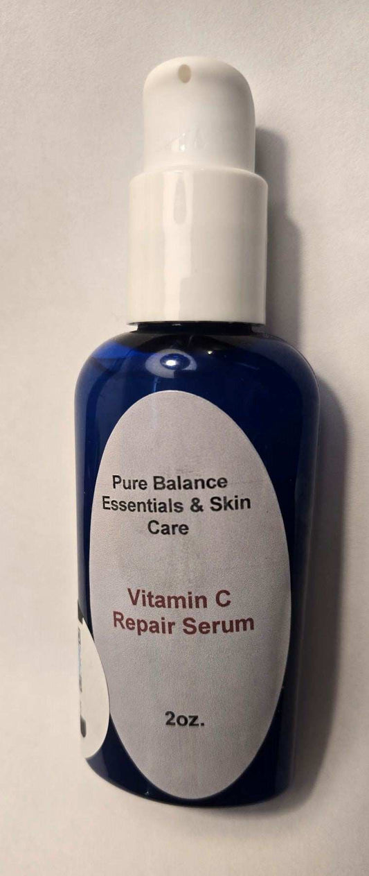 Blue bottle of Vitamin C Repair Serum, 2oz, by Pure Balance Essentials & Skin Care.